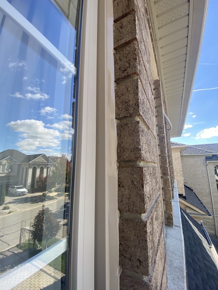After: Brick window, jamb — old bead cut out, new bead tooled frame to brick